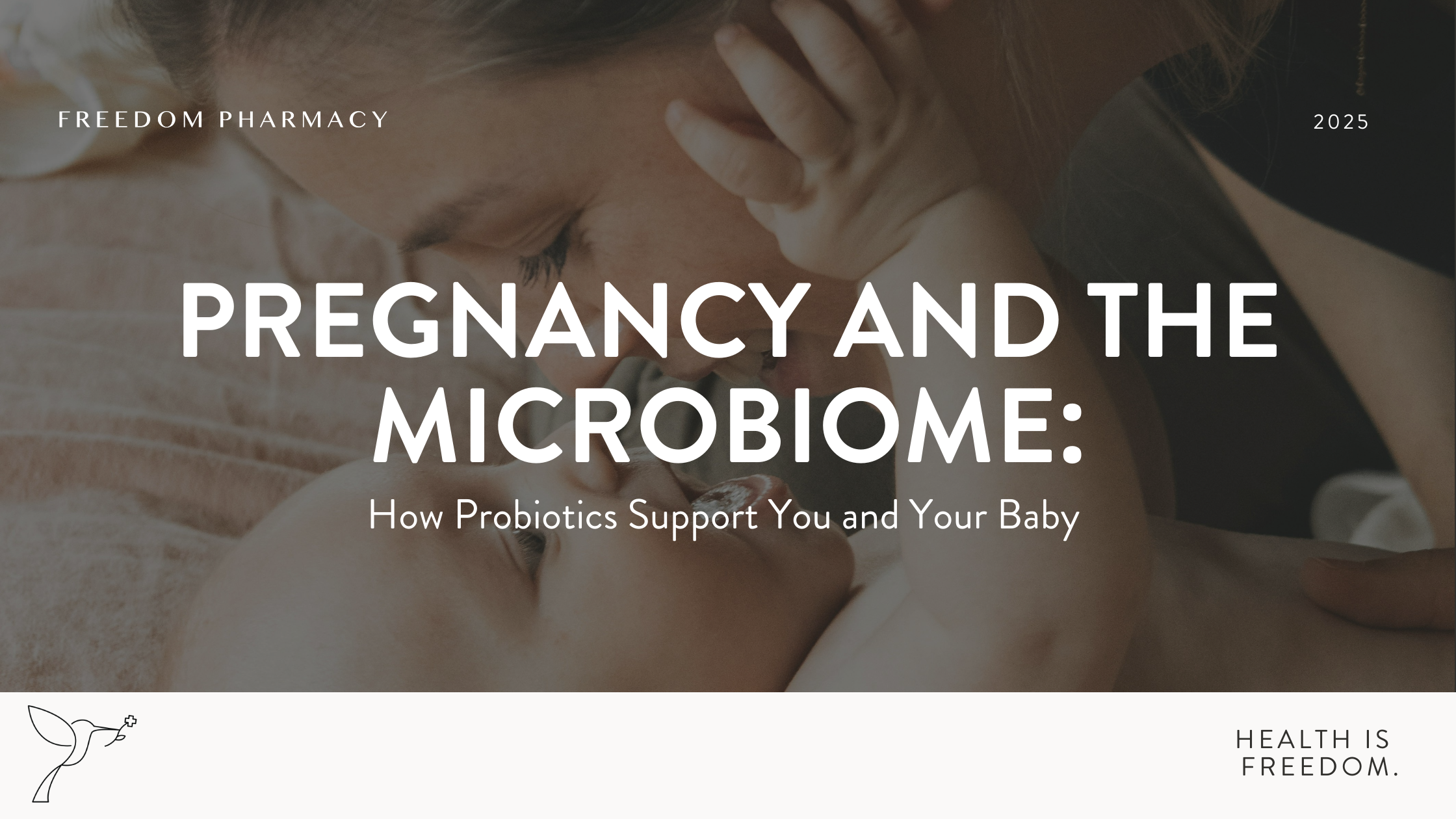 Mother gently kissing her baby while laying on a soft surface, symbolizing the connection between pregnancy, microbiome health, and infant development.